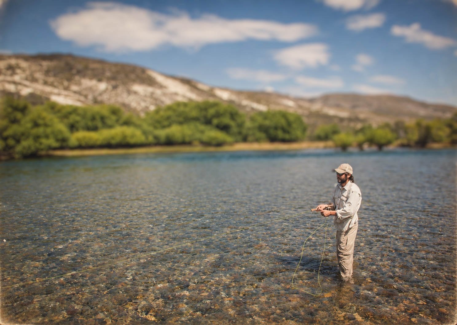 Young Emanuel Medina wading the Limay River in his early days as a fly fishing guide in Bariloche, Patagonia, Argentina